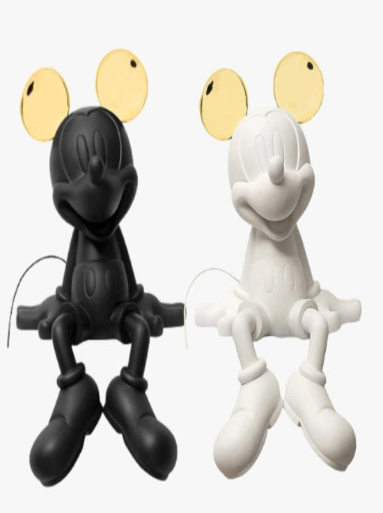 Mickey mouse zittend